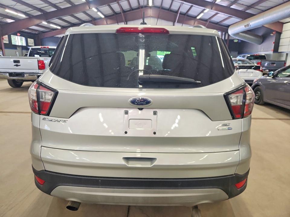 Photo 6 from auction – 2018 FORD ESCAPE with VIN 1FMCU9GD2JUA75321