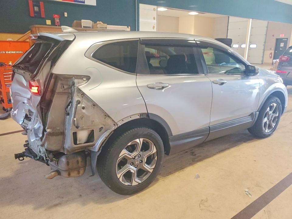 Photo 3 from auction – 2019 HONDA CR-V with VIN 2HKRW2H50KH610312