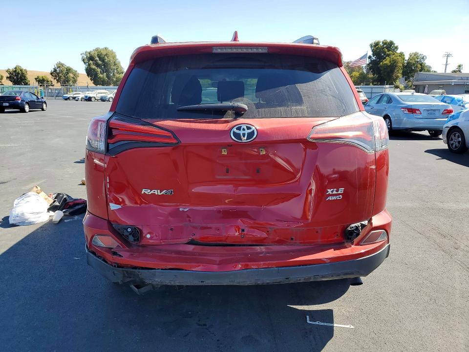 Photo 6 from auction – 2016 TOYOTA RAV4 with VIN 2T3RFREV4GW441540