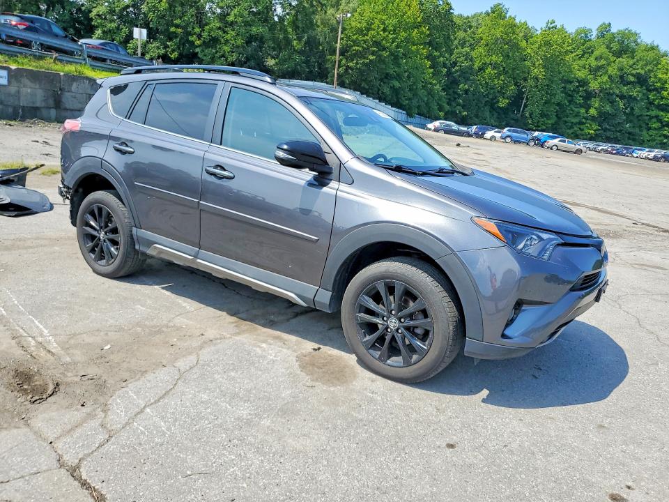 Photo 4 from auction – 2018 TOYOTA RAV4 with VIN 2T3RFREV1JW700959