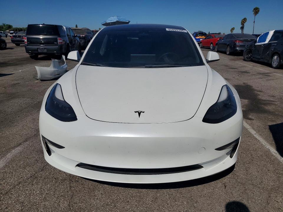 Photo 5 from auction – 2022 TESLA MODEL 3 with VIN 5YJ3E1EA8NF134947