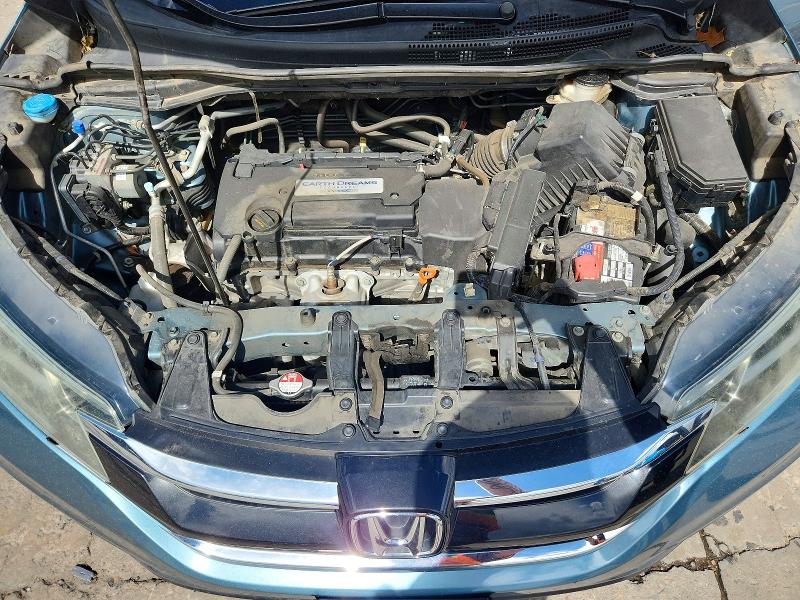 Photo 12 from auction – 2015 HONDA CR-V with VIN 5J6RM4H32FL083384