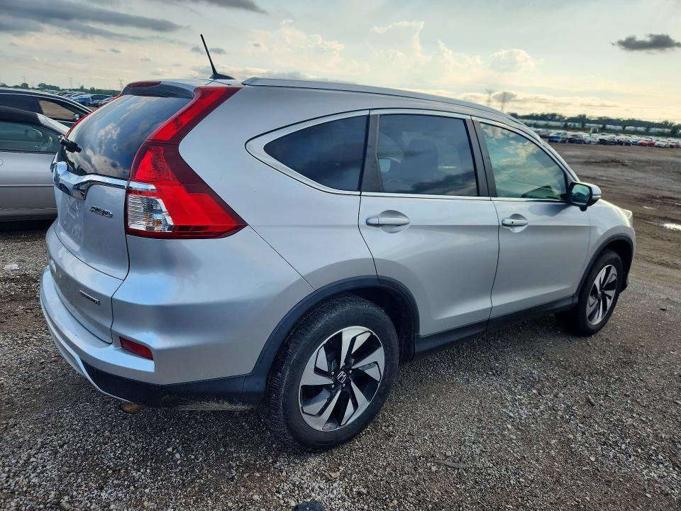 Photo 3 from auction – 2016 HONDA CR-V with VIN 5J6RM4H90GL101032
