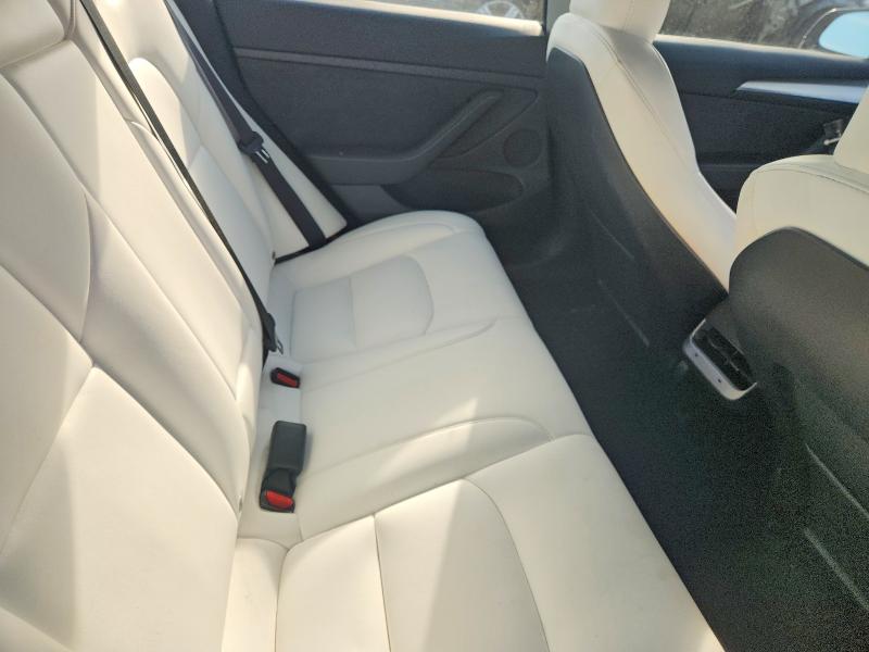 Photo 10 from auction – 2023 TESLA MODEL 3 with VIN 5YJ3E1EBXPF660900