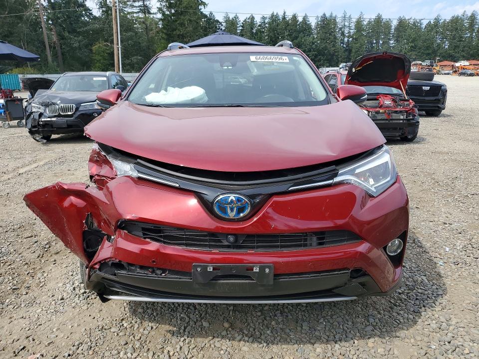 Photo 5 from auction – 2018 TOYOTA RAV4 HV with VIN JTMDJREV0JD214973