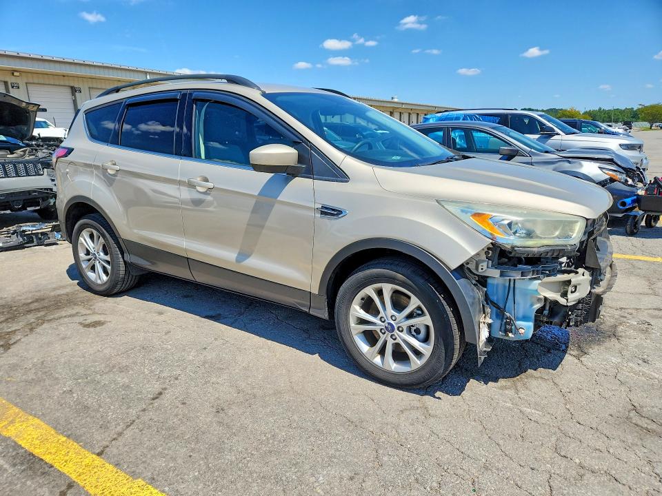 Photo 4 from auction – 2017 FORD ESCAPE with VIN 1FMCU9GD8HUD54685