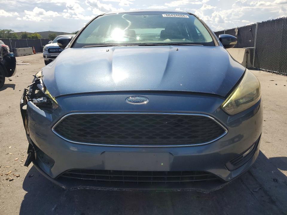 Photo 5 from auction – 2018 FORD FOCUS with VIN 1FADP3M21JL308441