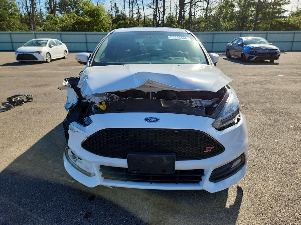 Снимка 5 от търг – 2018 FORD FOCUS с VIN 1FADP3L9XJL290973