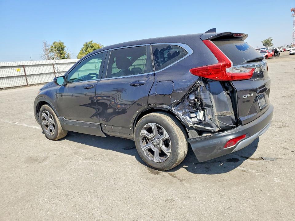 Photo 2 from auction – 2018 HONDA CR-V with VIN 7FARW1H83JE023219