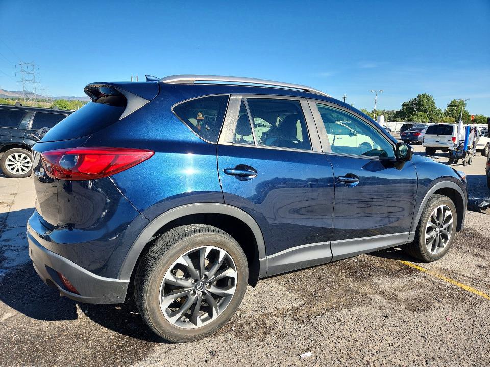 Photo 3 from auction – 2016 MAZDA CX-5 with VIN JM3KE4DY5G0603027
