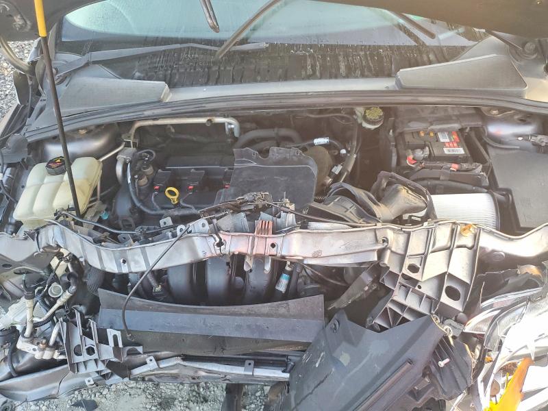 Photo 11 from auction – 2013 FORD FOCUS with VIN 1FADP3E2XDL369094