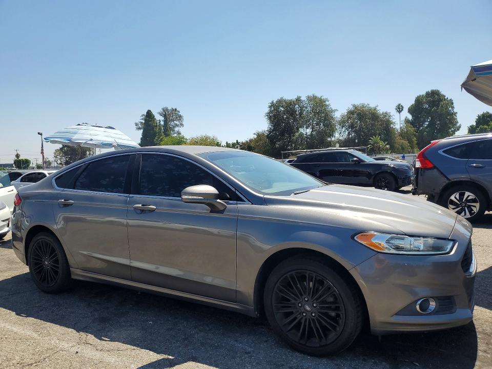 Photo 4 from auction – 2014 FORD FUSION with VIN 3FA6P0HD6ER194897