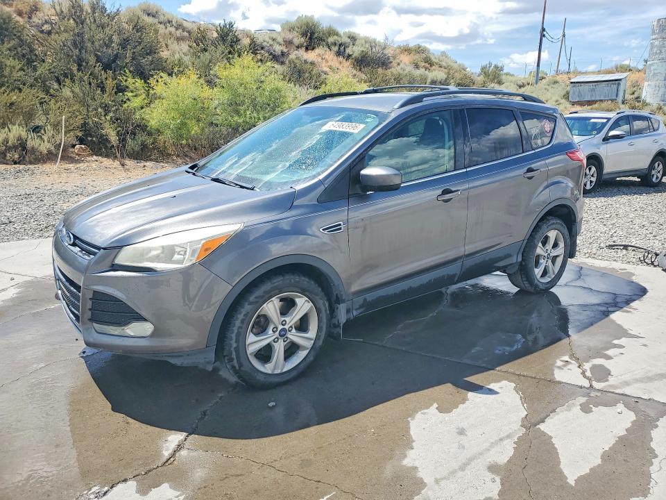 FORD ESCAPE 2014 with VIN 1FMCU9G99EUC52433 - Photo from auction