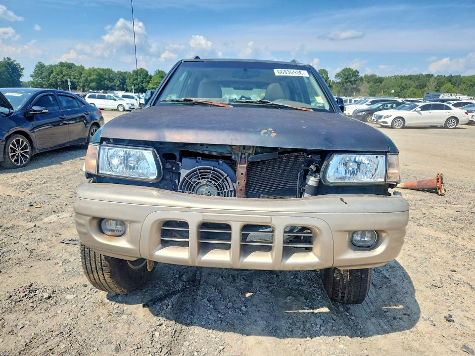 Photo 5 from auction – 2000 HONDA PASSPORT with VIN 4S6DM58W7Y4415366