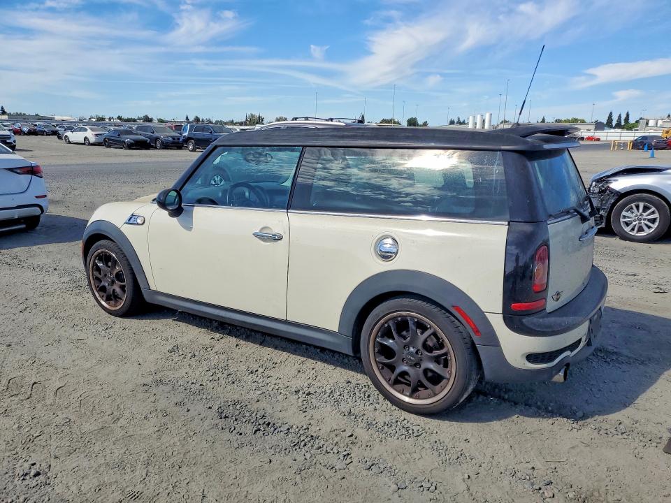 Photo 2 from auction – 2009 MINI COOPER with VIN WMWMM335X9TP92102