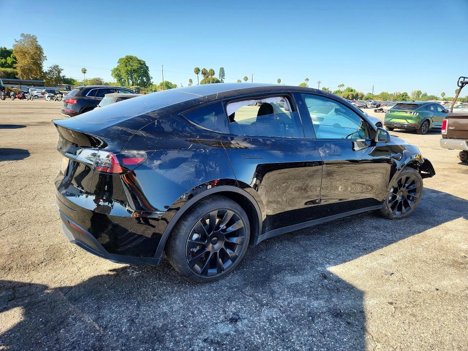 Photo 3 from auction – 2023 TESLA MODEL Y with VIN 7SAYGDEE7PA051243