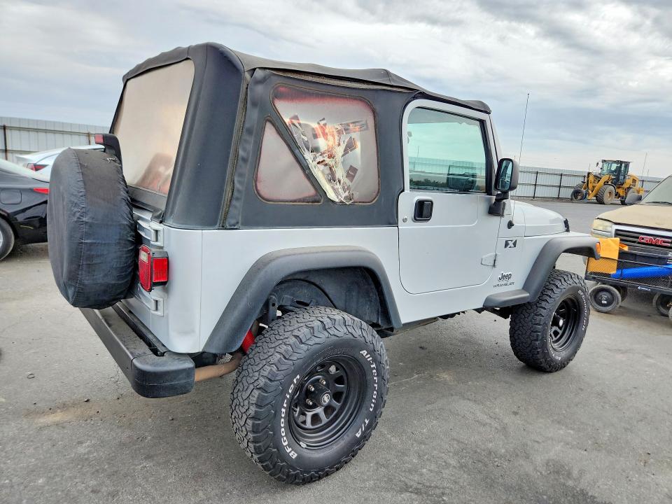 Photo 3 from auction – 2004 JEEP WRANGLER with VIN 1J4FA39S04P746081