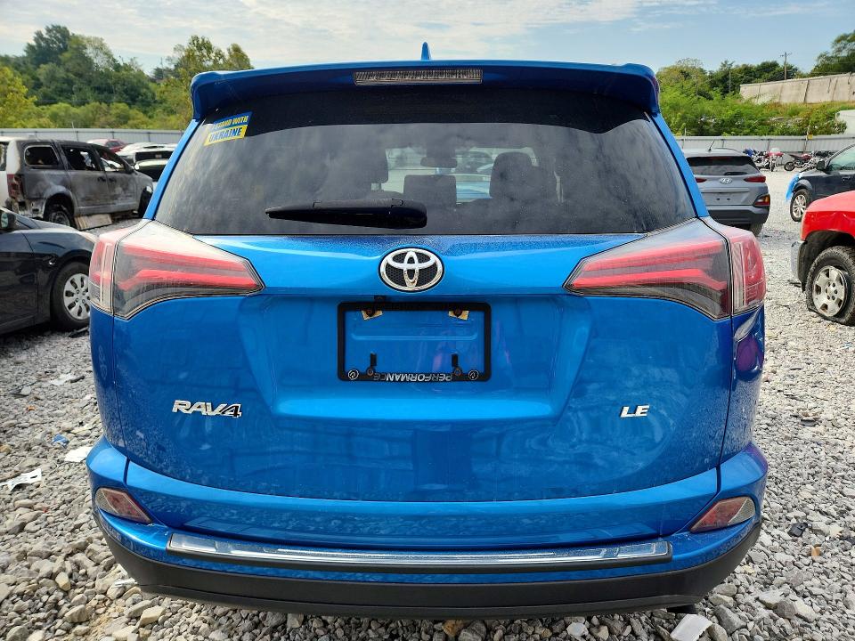 Photo 6 from auction – 2018 TOYOTA RAV4 with VIN JTMZFREV6JJ190011