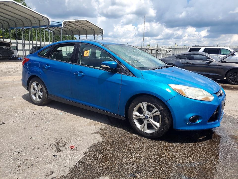 Photo 4 from auction – 2014 FORD FOCUS with VIN 1FADP3F24EL172521