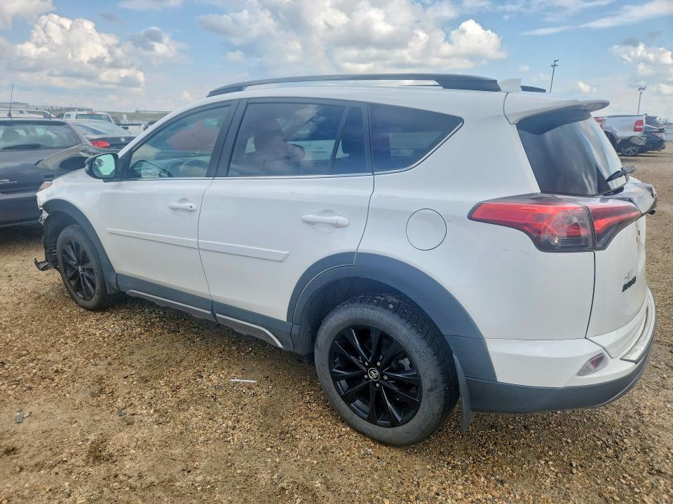 Photo 2 from auction – 2018 TOYOTA RAV4 with VIN 2T3RFREV8JW833458
