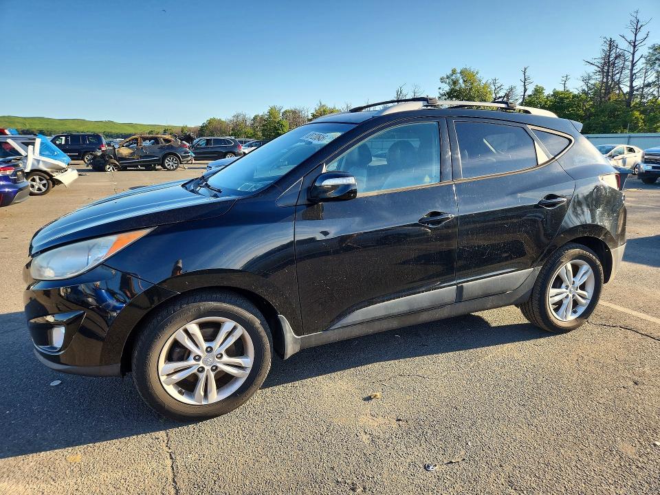 HYUNDAI TUCSON 2013 with VIN KM8JUCAC5DU611168 - Photo from auction