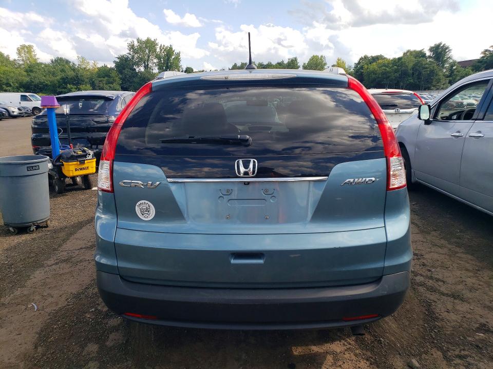 Photo 6 from auction – 2014 HONDA CR-V with VIN 2HKRM4H74EH612930
