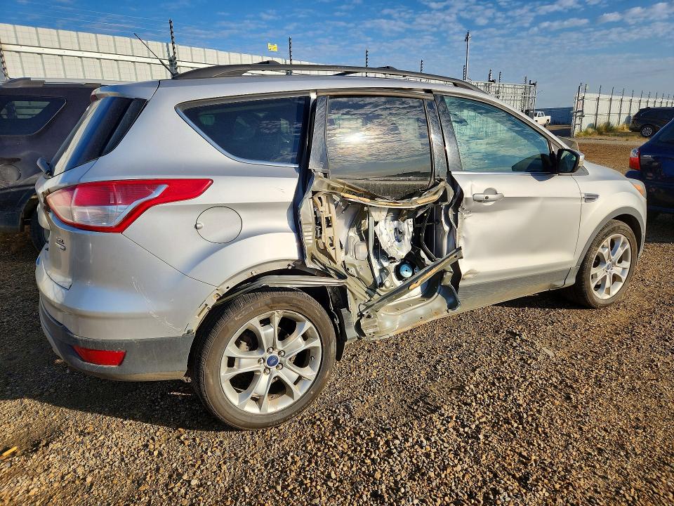 Photo 3 from auction – 2013 FORD ESCAPE with VIN 1FMCU9H9XDUC57525