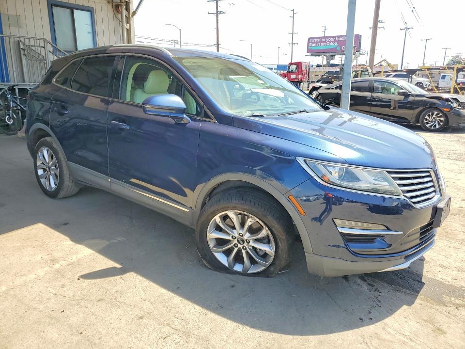 Photo 4 from auction – 2015 LINCOLN MKC with VIN 5LMCJ2A97FUJ47929