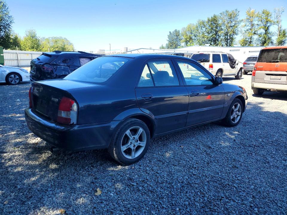 Photo 3 from auction – 2003 MAZDA PROTEGE with VIN JM1BJ225930178553