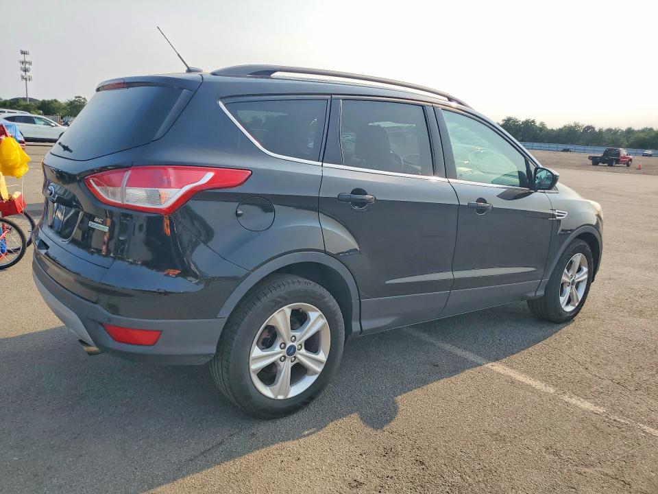 Photo 3 from auction – 2016 FORD ESCAPE with VIN 1FMCU0GX8GUA63981