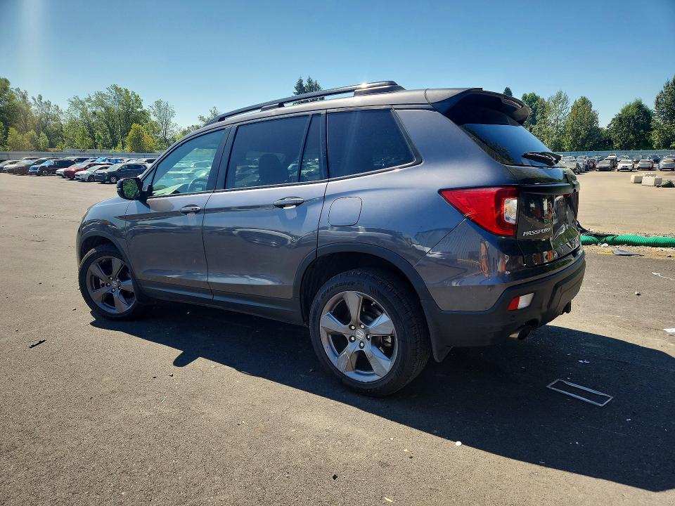 Photo 2 from auction – 2021 HONDA PASSPORT with VIN 5FNYF8H91MB025483