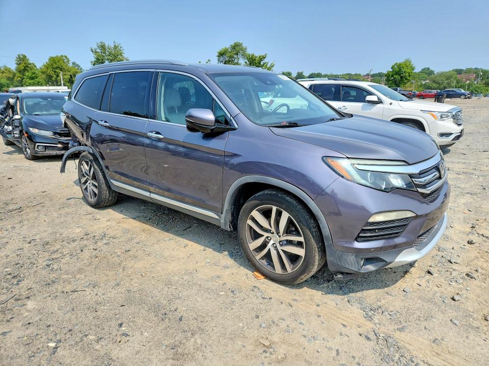 Photo 4 from auction – 2017 HONDA PILOT with VIN 5FNYF6H91HB009990