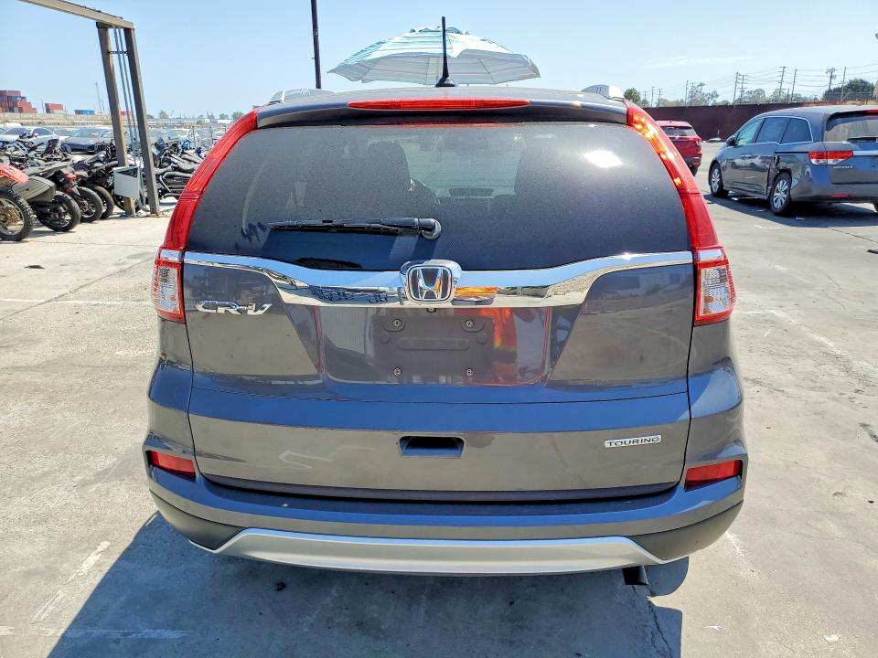 Photo 6 from auction – 2015 HONDA CR-V with VIN 5J6RM3H93FL018736