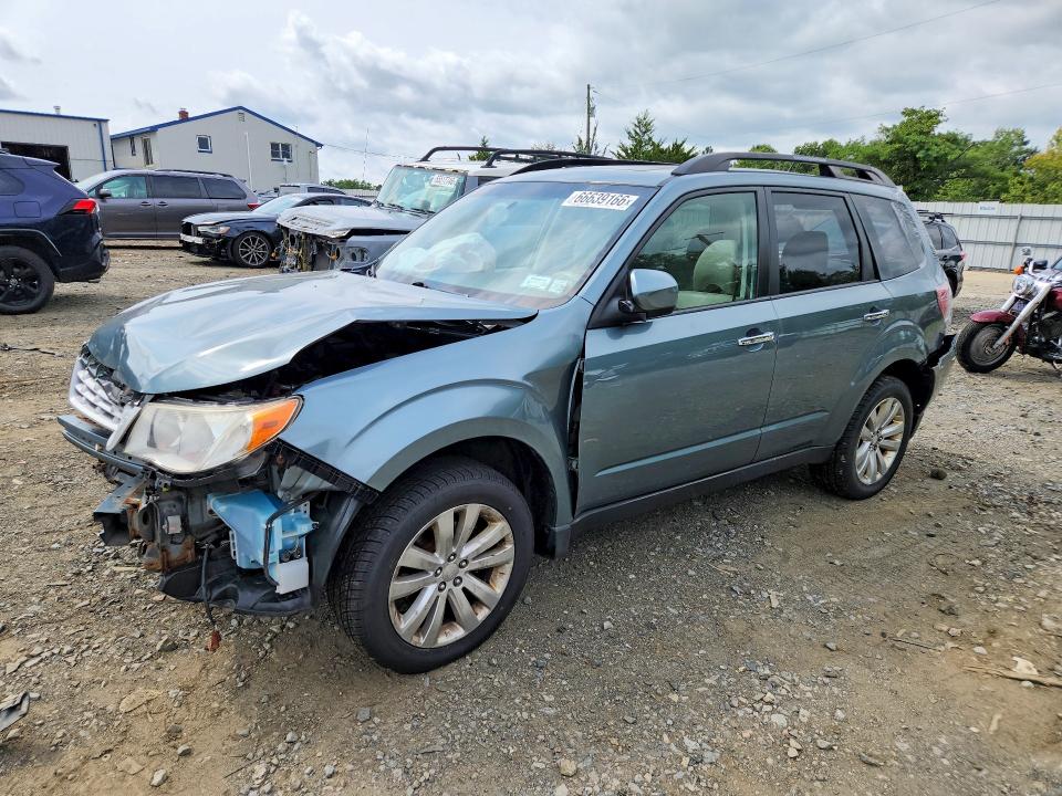 SUBARU FORESTER 2011 with VIN JF2SHAEC3BH719534 - Photo from auction