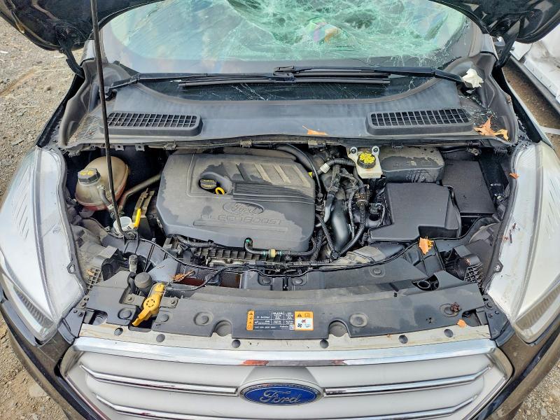 Photo 12 from auction – 2018 FORD ESCAPE with VIN 1FMCU9GD9JUC40703