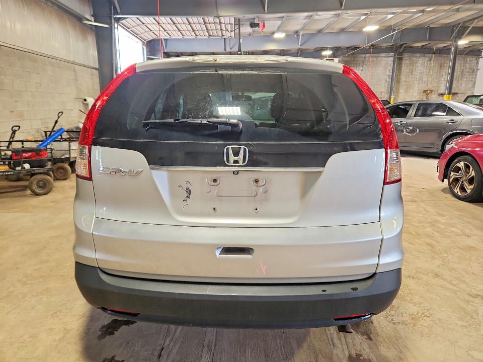 Photo 6 from auction – 2014 HONDA CR-V with VIN 3CZRM3H54EG703692