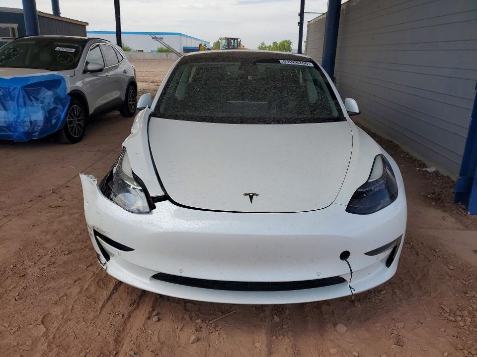 Photo 5 from auction – 2021 TESLA MODEL 3 with VIN 5YJ3E1EA9MF026707