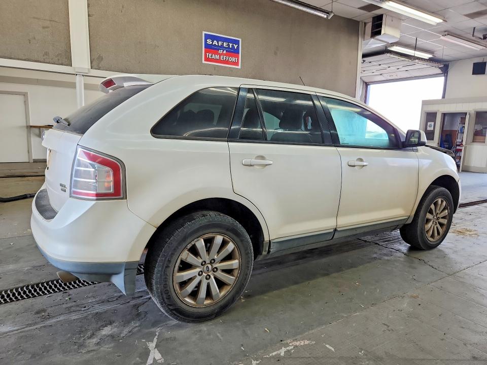 Photo 3 from auction – 2010 FORD EDGE with VIN 2FMDK4JC6ABA77477