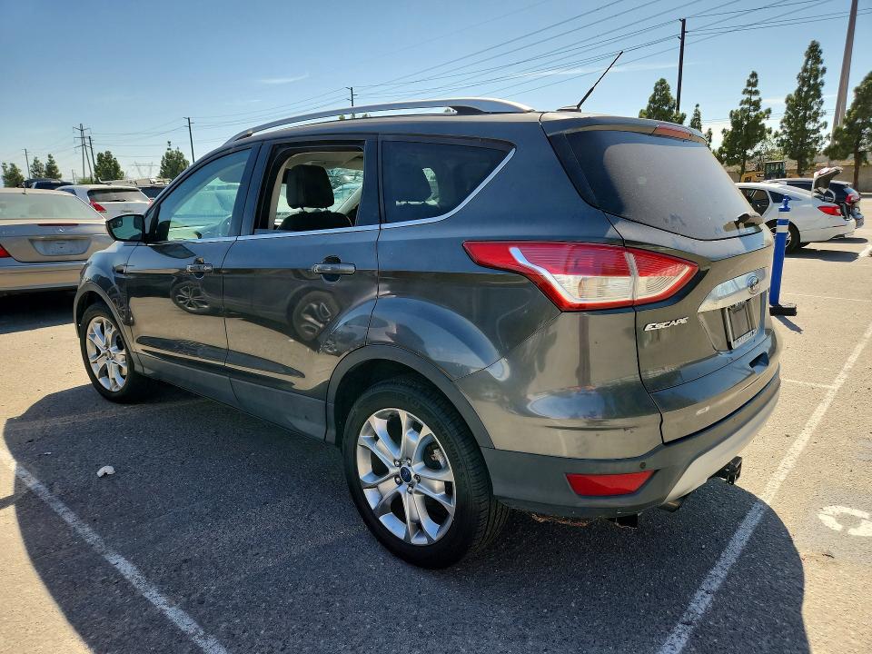 Photo 2 from auction – 2016 FORD ESCAPE with VIN 1FMCU0J98GUB01185