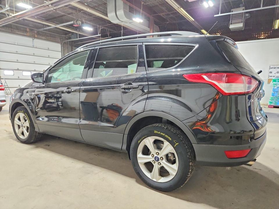 Снимка 2 от търг – 2014 FORD ESCAPE с VIN 1FMCU9GX3EUD44121