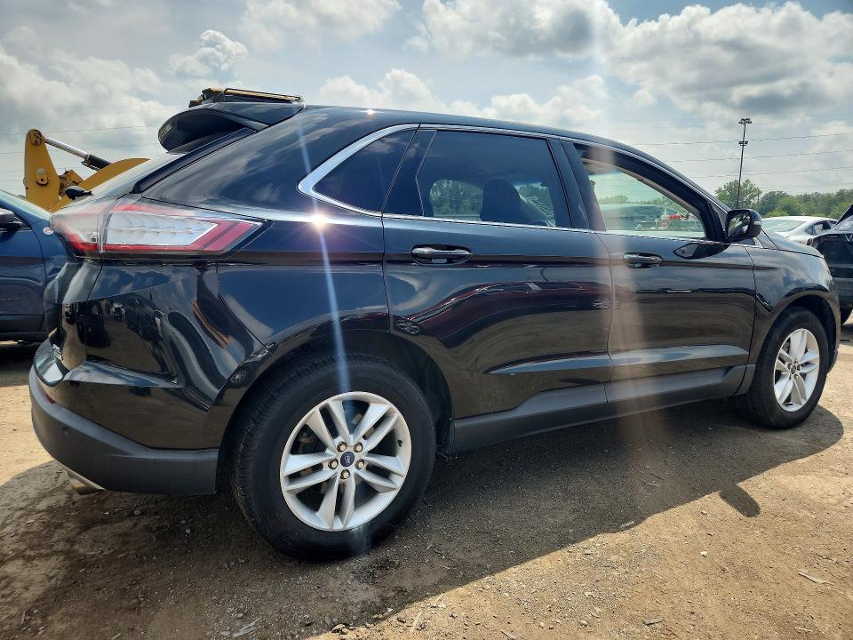 Photo 3 from auction – 2015 FORD EDGE with VIN 2FMTK3J90FBB12094