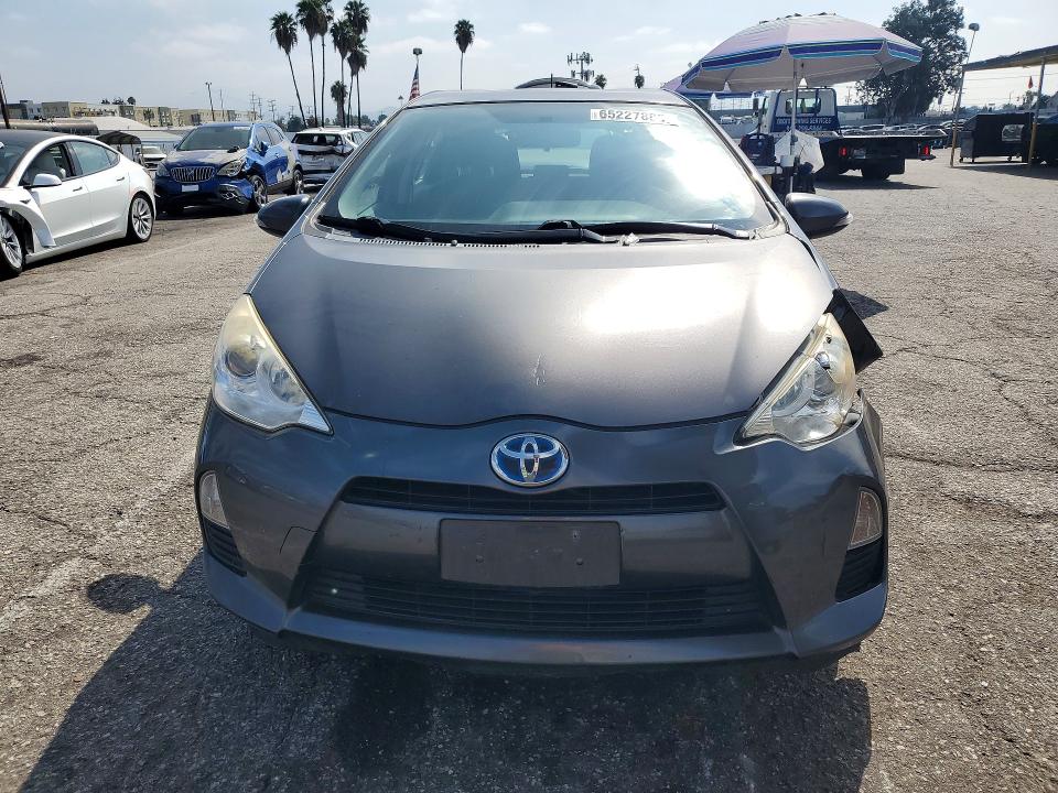 Photo 5 from auction – 2014 TOYOTA PRIUS C with VIN JTDKDTB34E1064498