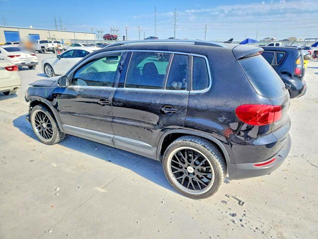 Photo 2 from auction – 2014 VOLKSWAGEN TIGUAN with VIN WVGAV3AX7EW528024