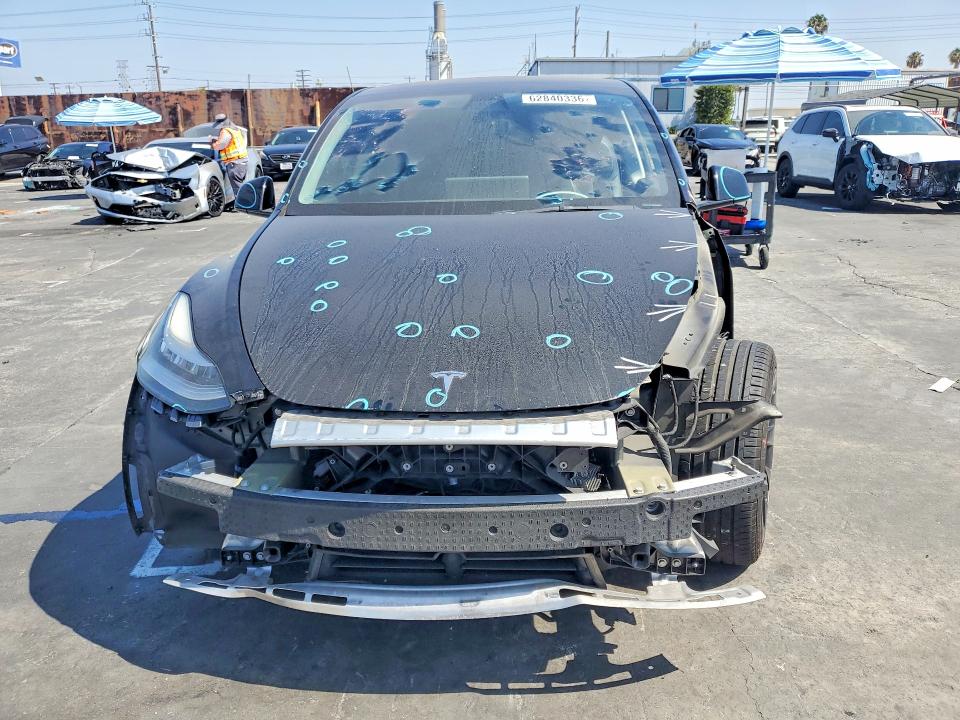 Photo 5 from auction – 2022 TESLA MODEL Y with VIN 7SAYGDEE2NF351420