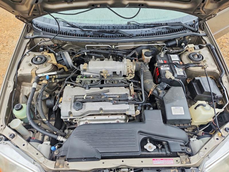 Photo 11 from auction – 1999 MAZDA PROTEGE with VIN JM1BJ2225X0117745