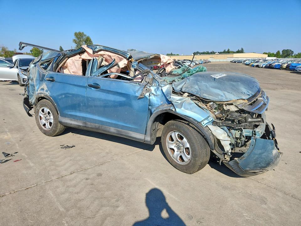 Photo 4 from auction – 2014 HONDA CR-V with VIN 2HKRM3H30EH558677