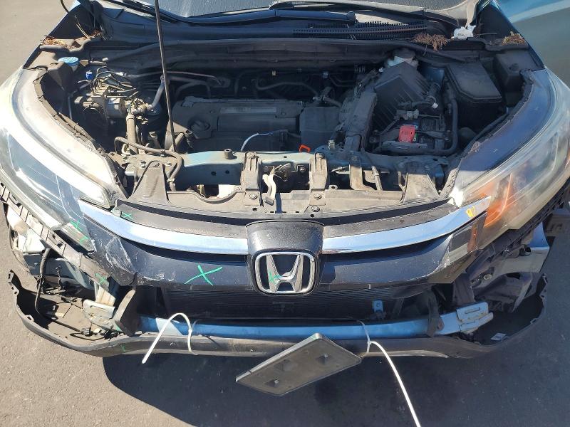 Photo 11 from auction – 2015 HONDA CR-V with VIN 2HKRM4H79FH642653