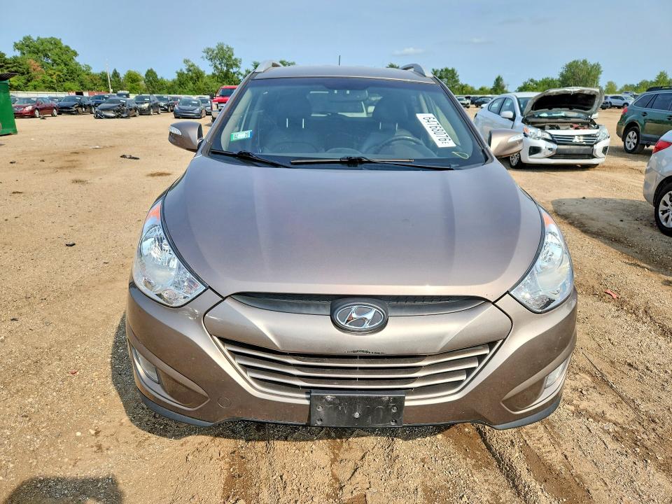Photo 5 from auction – 2013 HYUNDAI TUCSON with VIN KM8JUCAC1DU617002