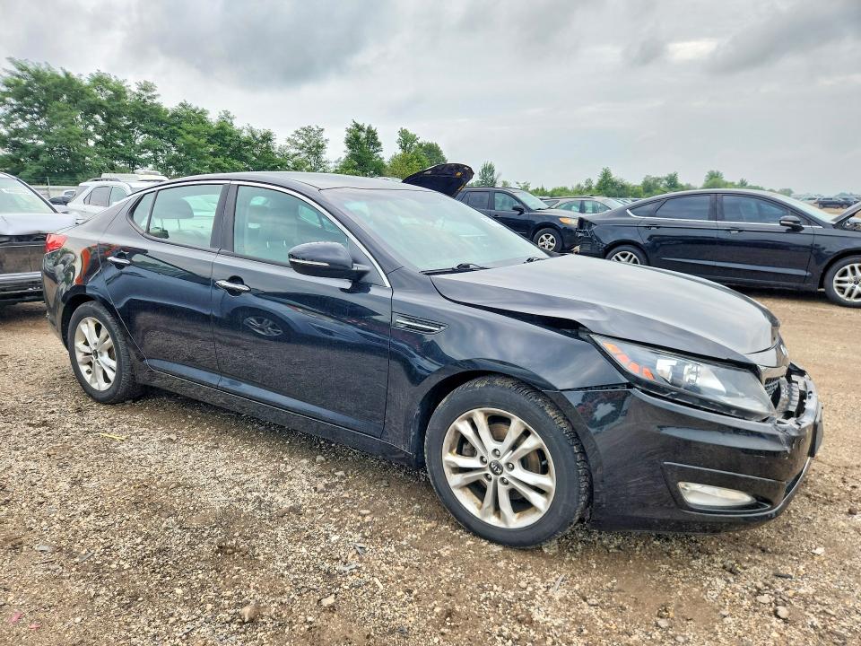 Photo 4 from auction – 2011 KIA OPTIMA with VIN KNAGN4A72B5145000
