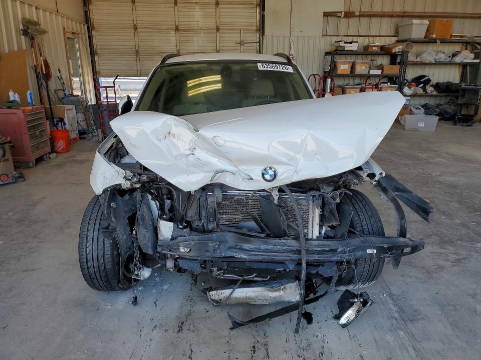 Photo 5 from auction – 2015 BMW X1 with VIN WBAVL1C58FVY33788